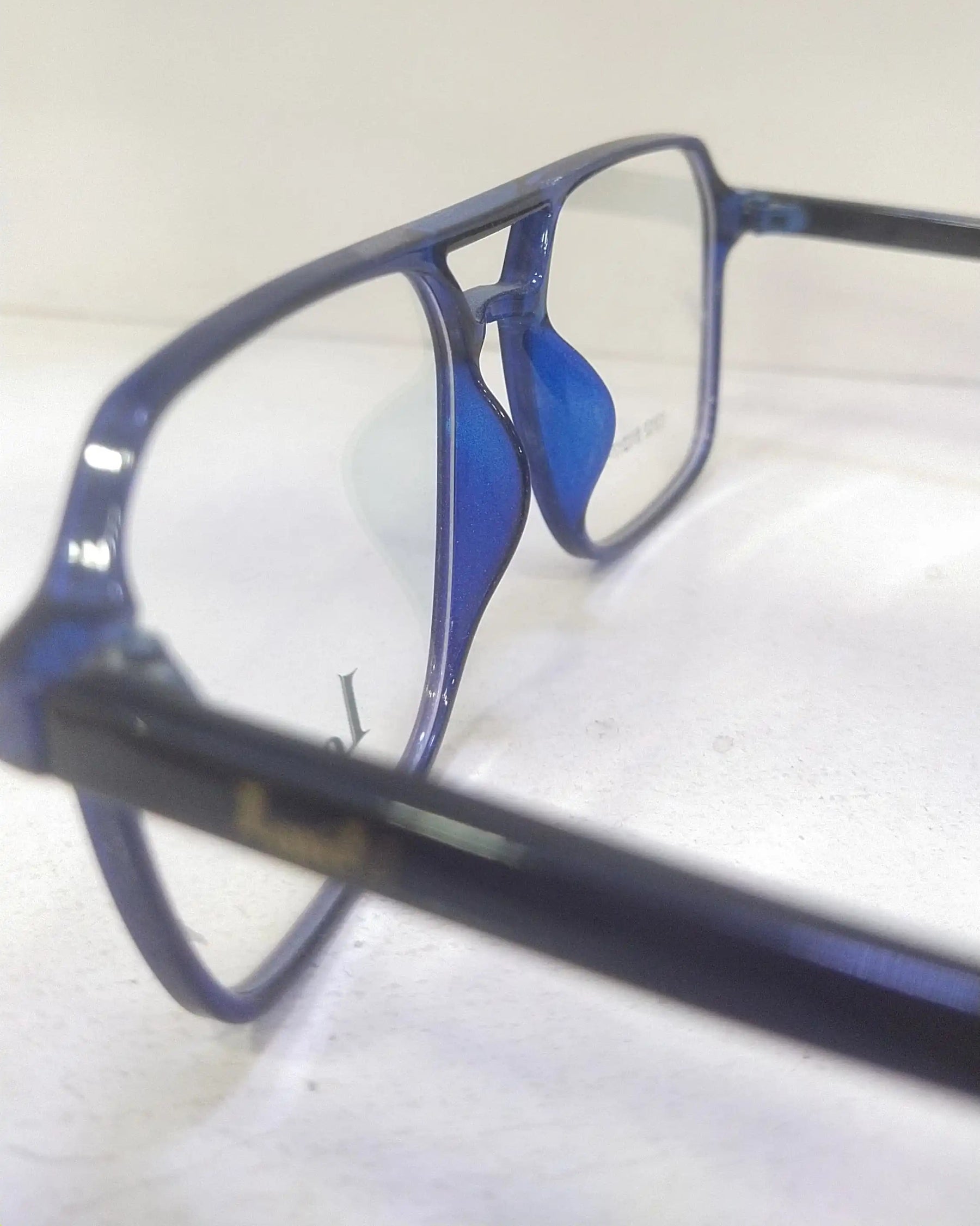 Glossy Blue LoveU Label Rectangular shape with a slight aviator-inspired design Frame side view